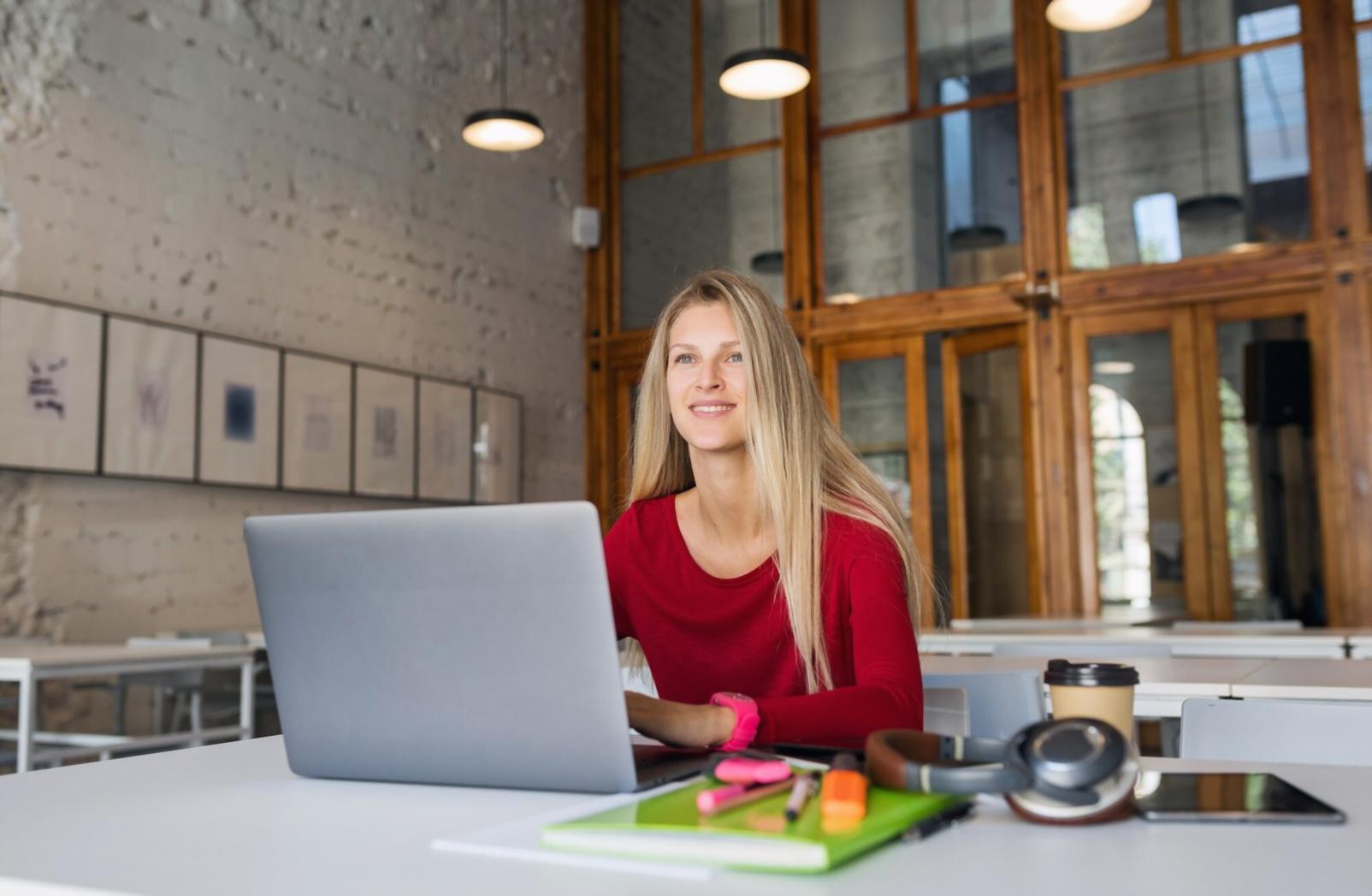 Students learning financial planning techniques in modern classroom setting